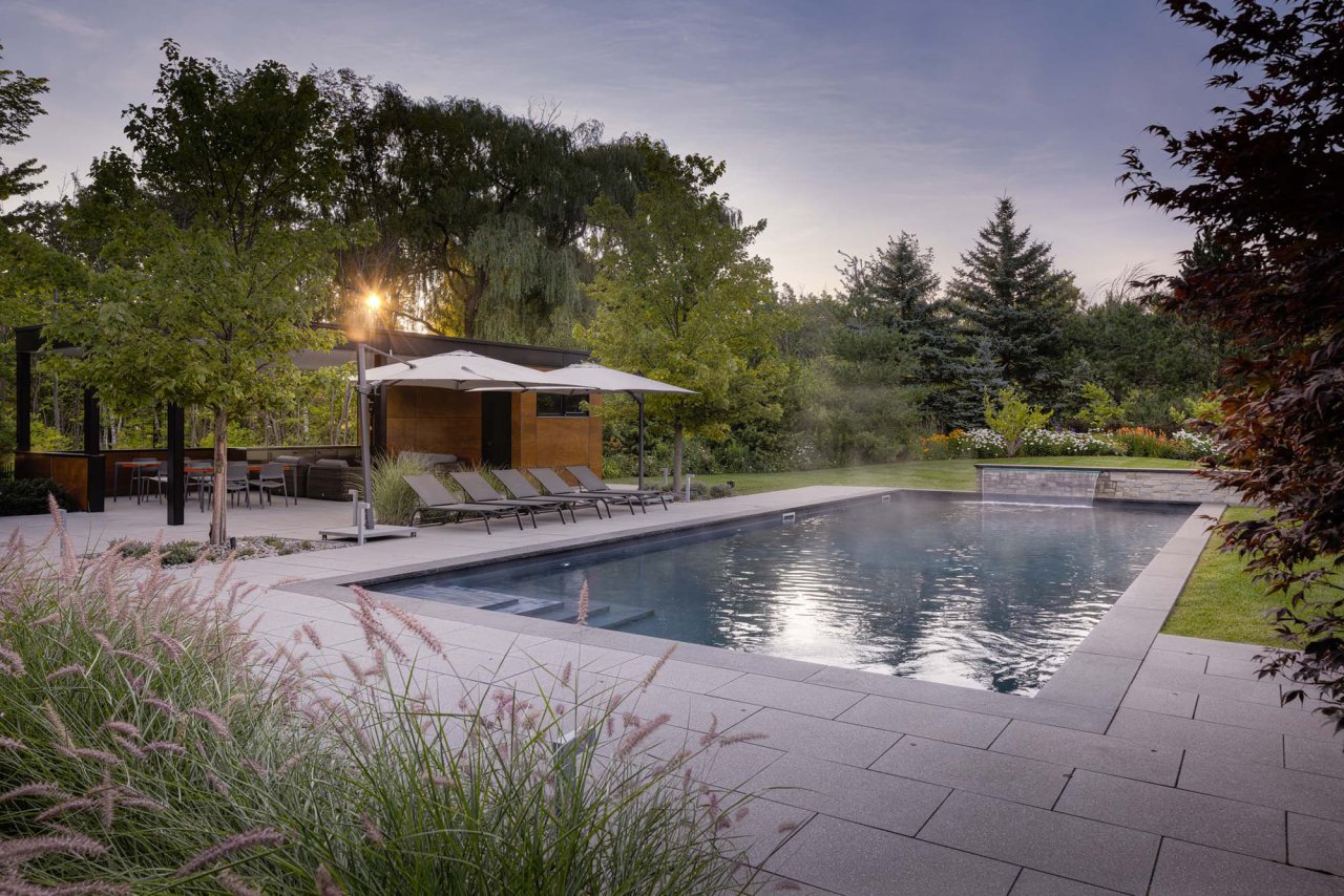 Beautiful backyard landscape with pool